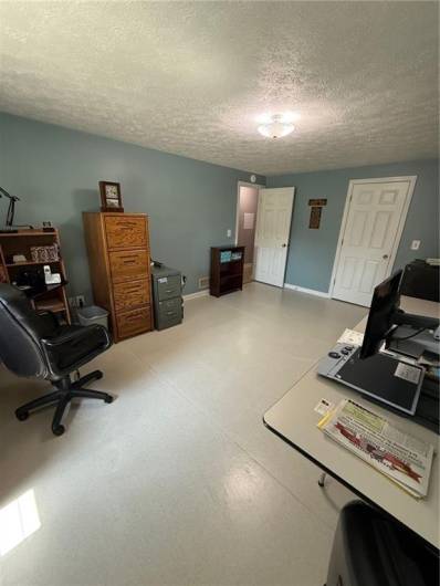 Bedroom or office as it is currently used. Very good closet space too.