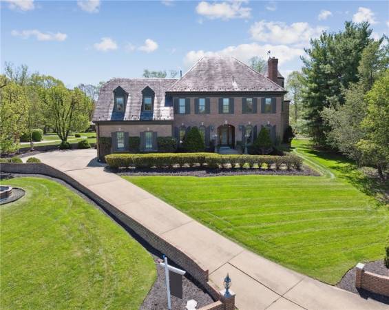 Welcome home to Treetop Lane, a private cul-de-sac in the Cidarlands neighborhood of Peters Township.