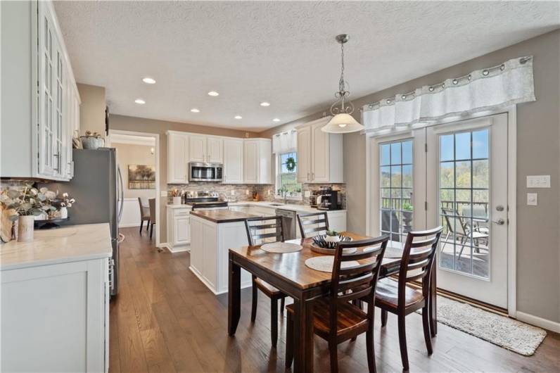 Quartz counters, tile backsplash...
