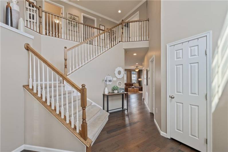 The entry to this home is regal...