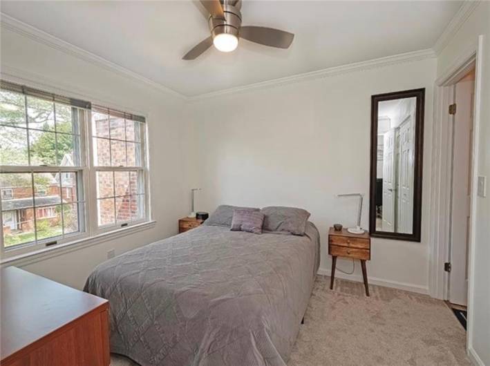 A 2nd bedroom with an ensuite bathroom