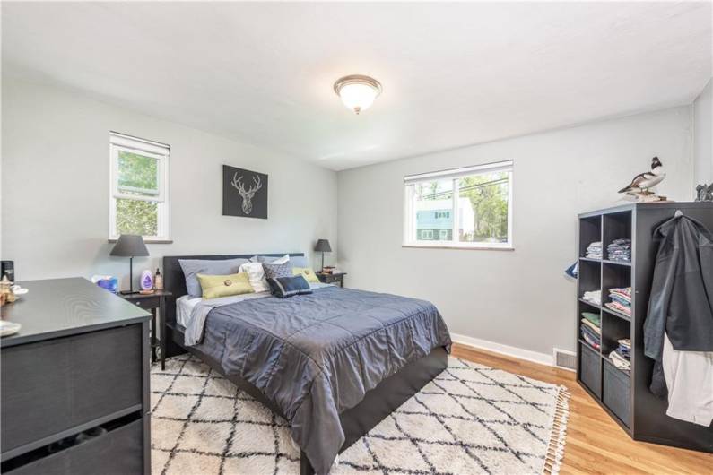 Nice sized primary with beautiful hard wood floors.
