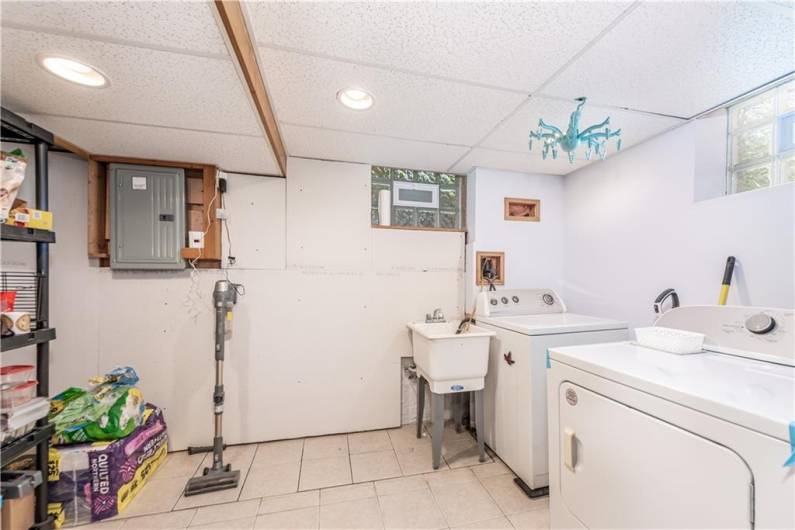 Laundry room and washer and dryer convey in sale.