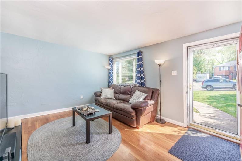 Great light from the picture window and the full glass, screen door.