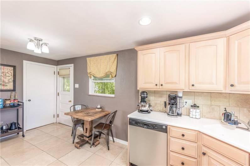 The dining area that is able to accommodate a larger table if desired.
