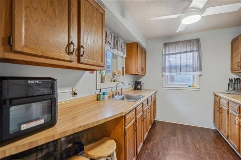 Area for counter stools perfect for a quick morning breakfast.