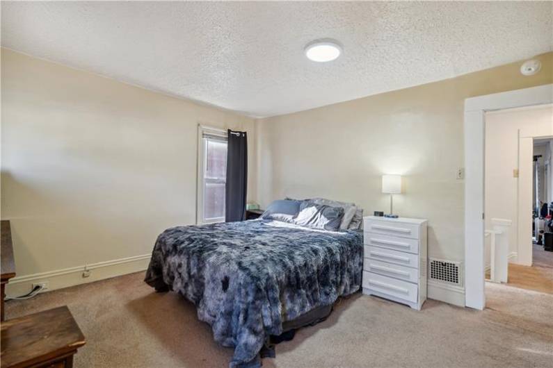 Upstairs you will find the spacious owner's suite.