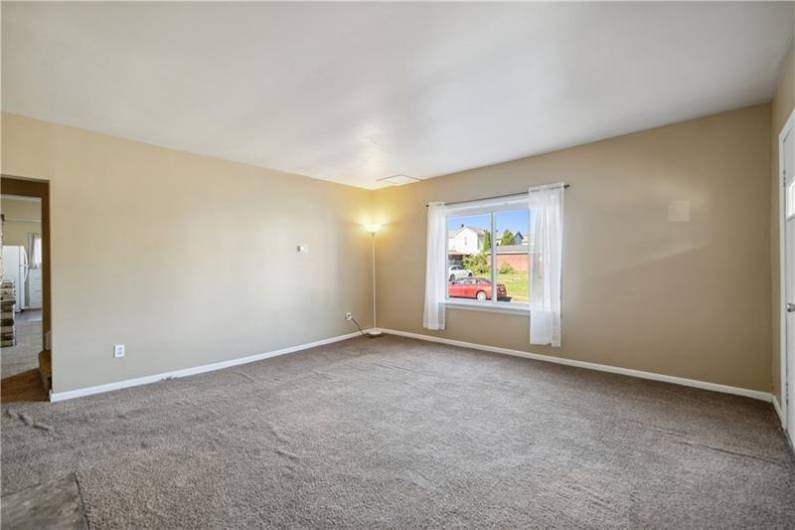 View leading into the dining room and kitchen.