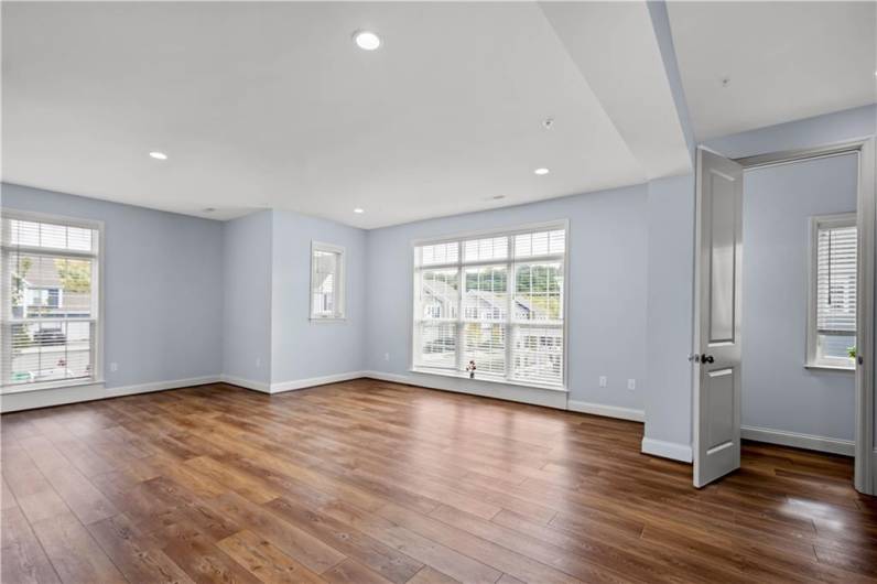 Family room with floor to Ceiling windows