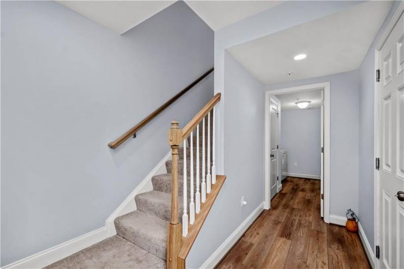 Lower Level - 2 Car garage and extra storage space.