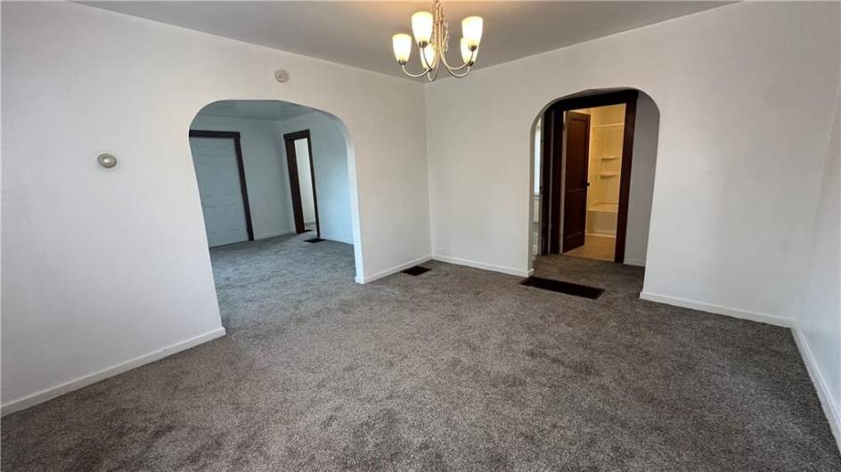 Dining room.  Looking into living room and bathroom/hall.