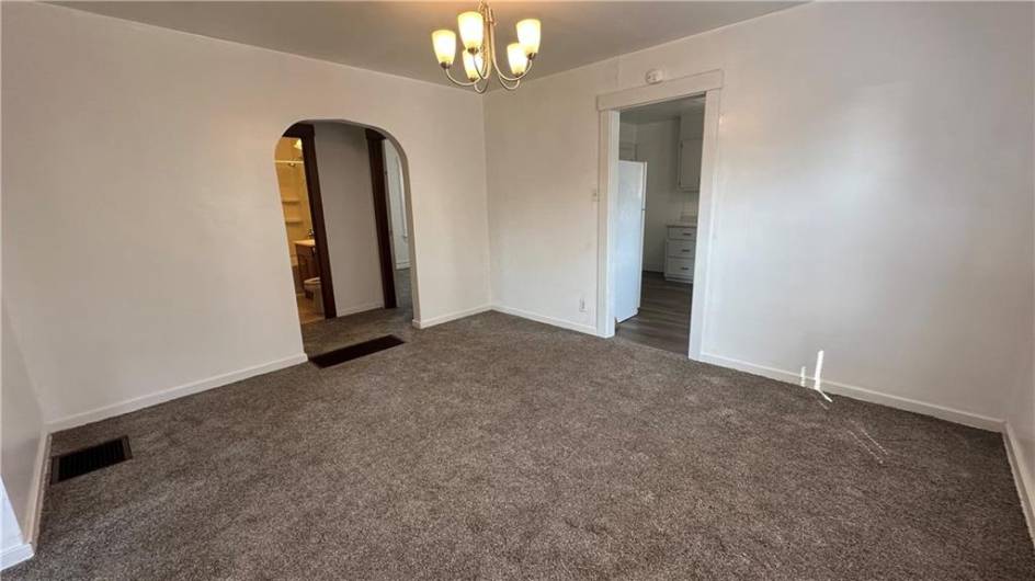 Dining room. Looking into hall and kitchen.
