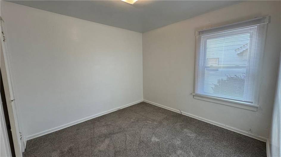 2nd bedroom.  Brand new paint and carpeting.