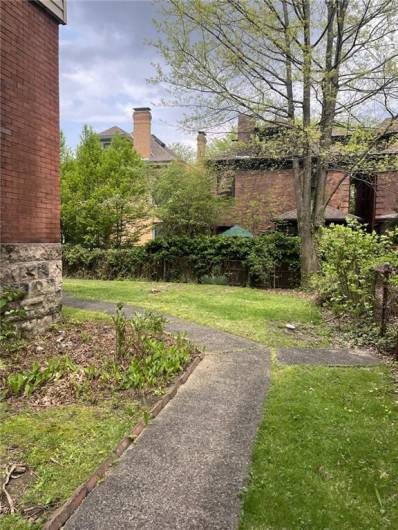Sidewalk to rear of building