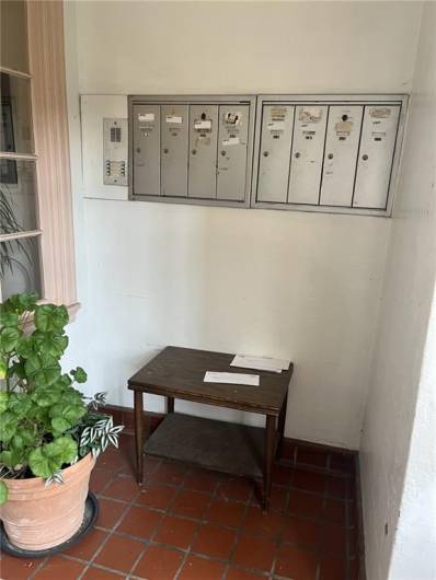 lobby with mailboxes after entering front door