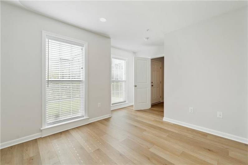 Ground level bonus space or office, immediately to the right when walking through the front door.