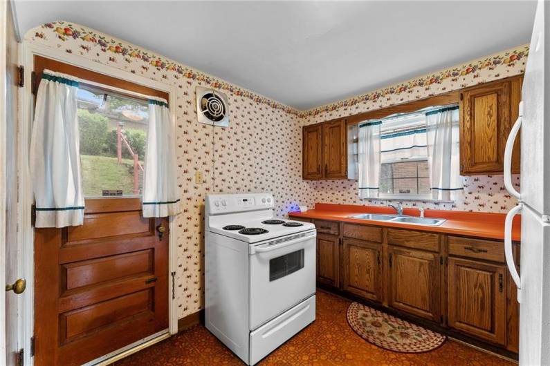 It may need some updating but this kitchen is large enough for two cooks