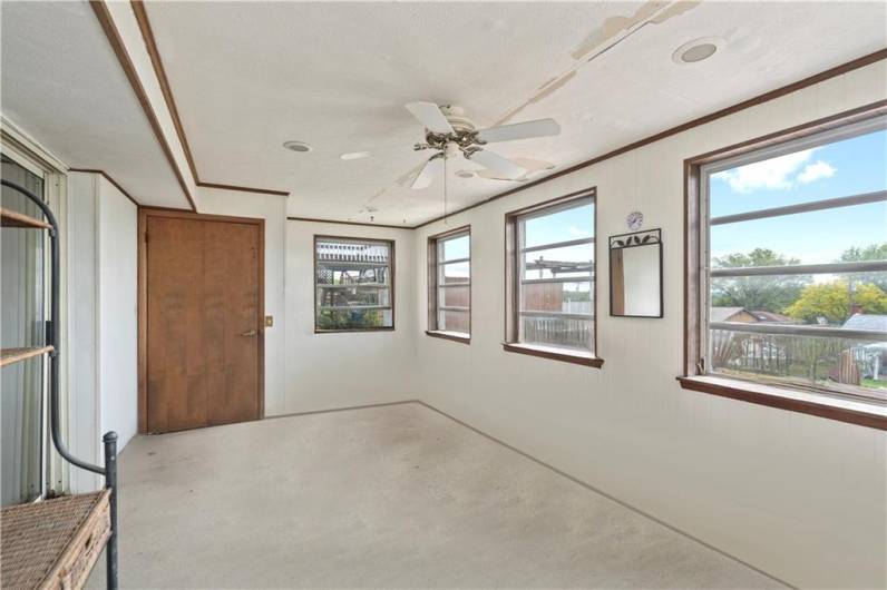 The sunroom is filled with natural light...