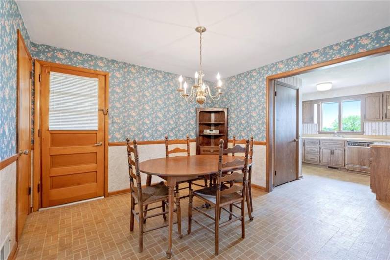 The dining room is open to the living room and the kitchen...