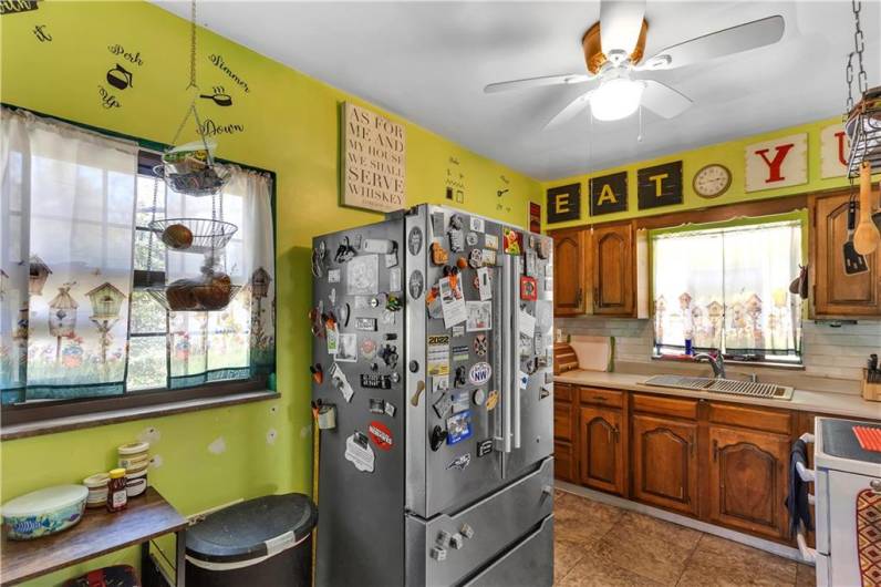 Light flows through this space - brightening the already-inviting kitchen...