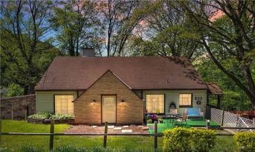 This home is dripping with storybook charm that you're sure to adore!