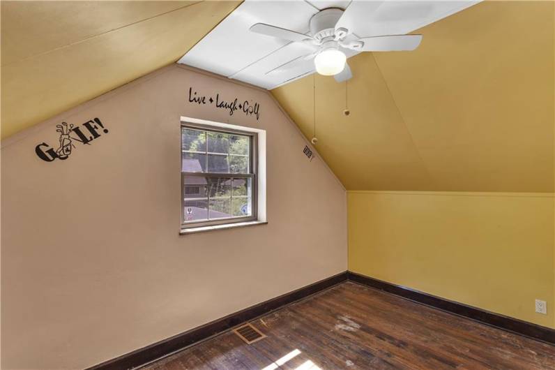Hardwood floors underscore this space...