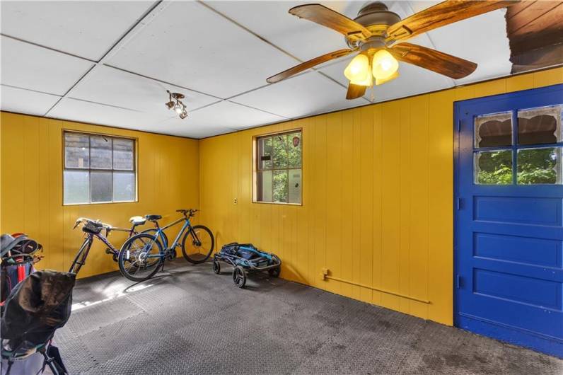 This room in the basement leads out to your expansive back deck.
