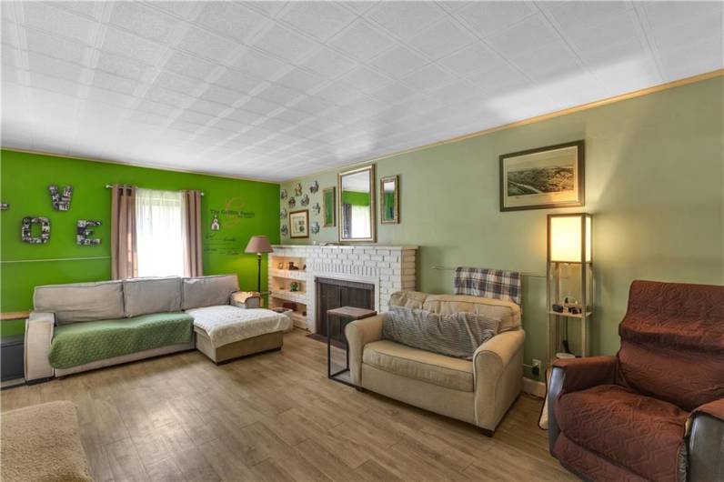 Attractive laminate floor flows throughout this space...