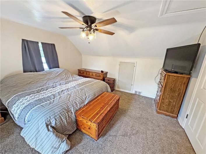 Master bedroom... access to storage in the eaves.