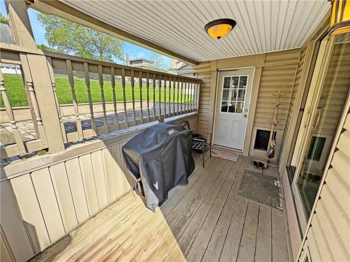 Deck area off the dining room and enclosed porch.