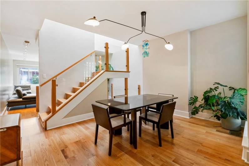 A large skylight over the open stairwell brings natural daylight light into the heart of this home. A spacious dining room provides ample space for even an oversized dining table