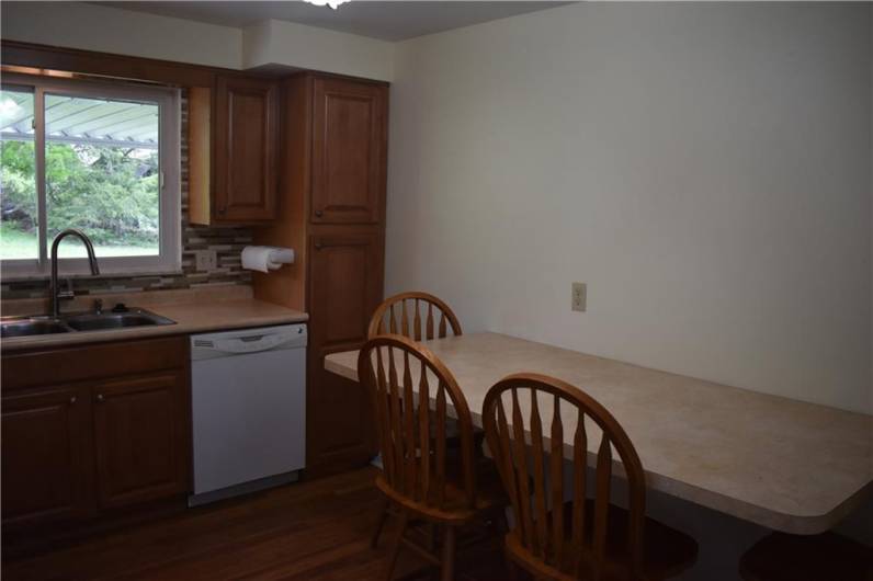 Built in Table and 4 Oak Chairs Included