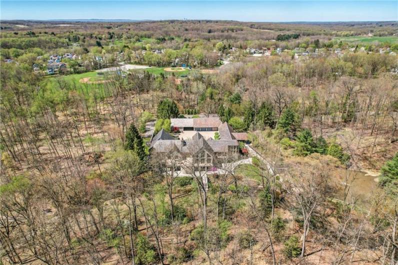 Privacy is paramount at 1700 Forker Blvd, beginning with the secure embrace of its gated private driveway. This exclusive entry offers peace of mind and a sense of complete seclusion for the fortunate owner.