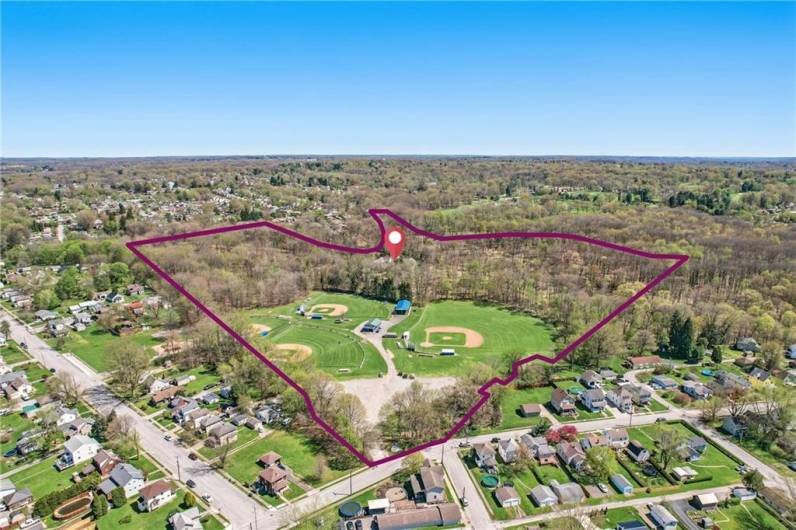 Beyond the verdant canopy lies a private realm encompassing the Sharpsville ball fields, the soothing melodies of natural streams and cascading waterfalls, and the serene shimmer of private lakes.