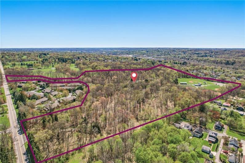 For the avid golfer, unparalleled amenity: direct adjacency to the renowned Buhl Farm Park Golf Course. Imagine stepping from your private 37-acre estate, directly onto the greens of the nation's only free public golf course.