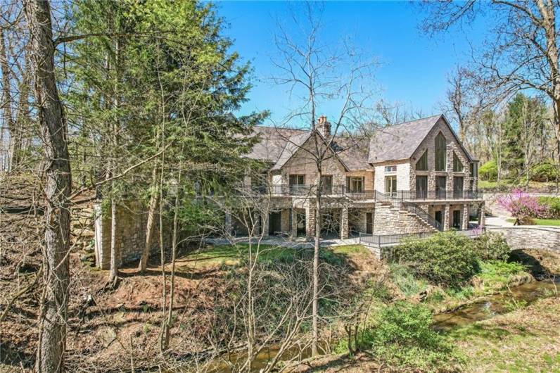 Scenic views abound from multi level wrap around balconies overlooking water features wildlife where deer abound.