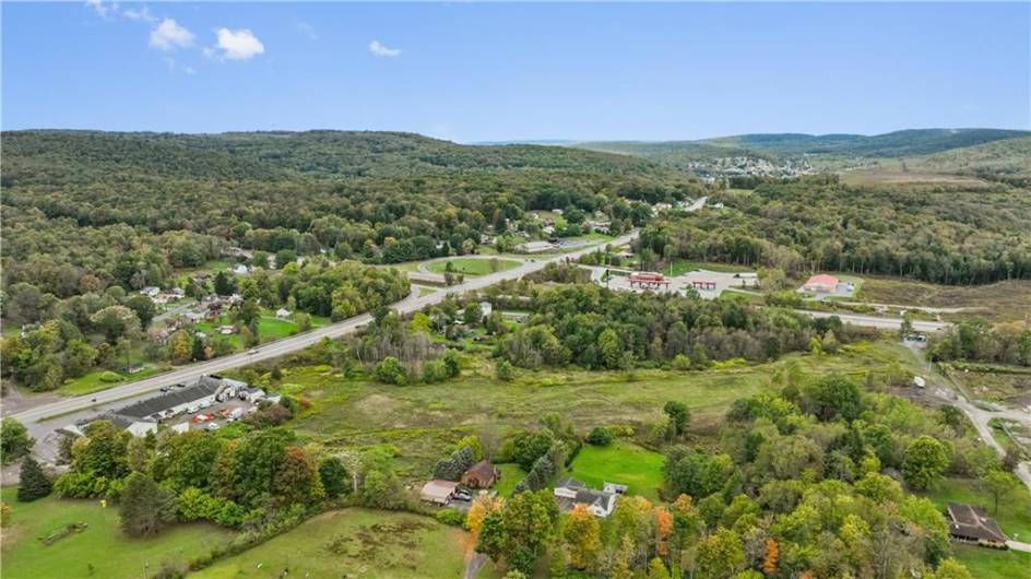 This level lot can be either a commercial or residential lot with two neighboring homes and behind Adams County Market and behind Pit Stop Sports Bar and Grill in Mundy's Corner.