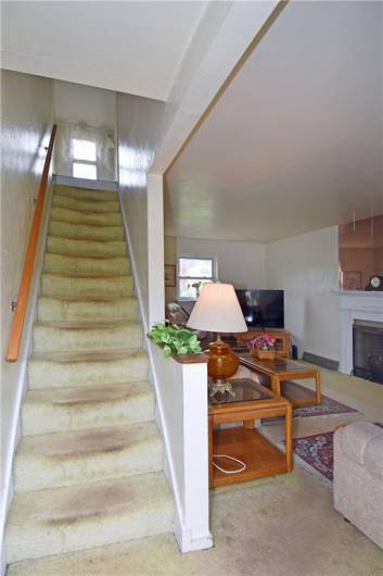 Notice the window at the top of the stairs, has storage seat under window, not shown