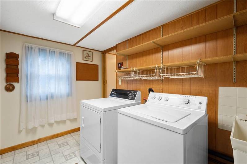 Laundry with included washer and dryer.