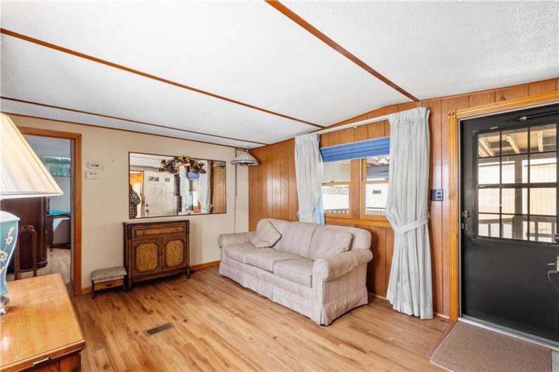 Living room with existing furnishings.