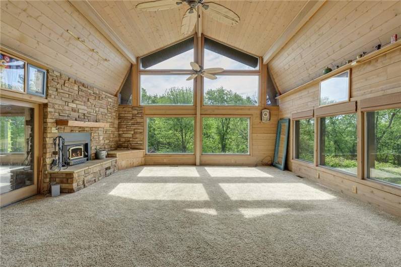 Beautiful 25x22 Family room w/wood burning fireplace and panoramic views.