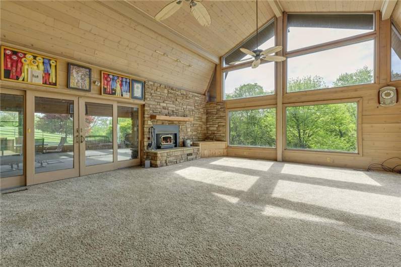 Beautiful 25x22 Family room w/wood burning fireplace and panoramic views.