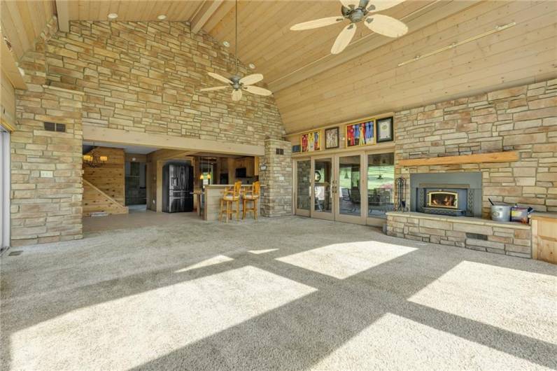 Glass sliding doors in the  family room lead to the enclosed patio!