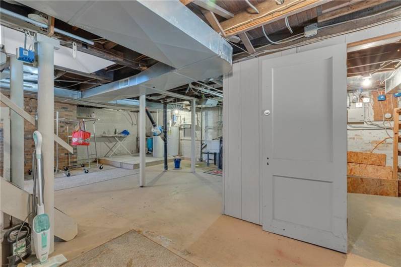 Walk out basement with additional storage area.