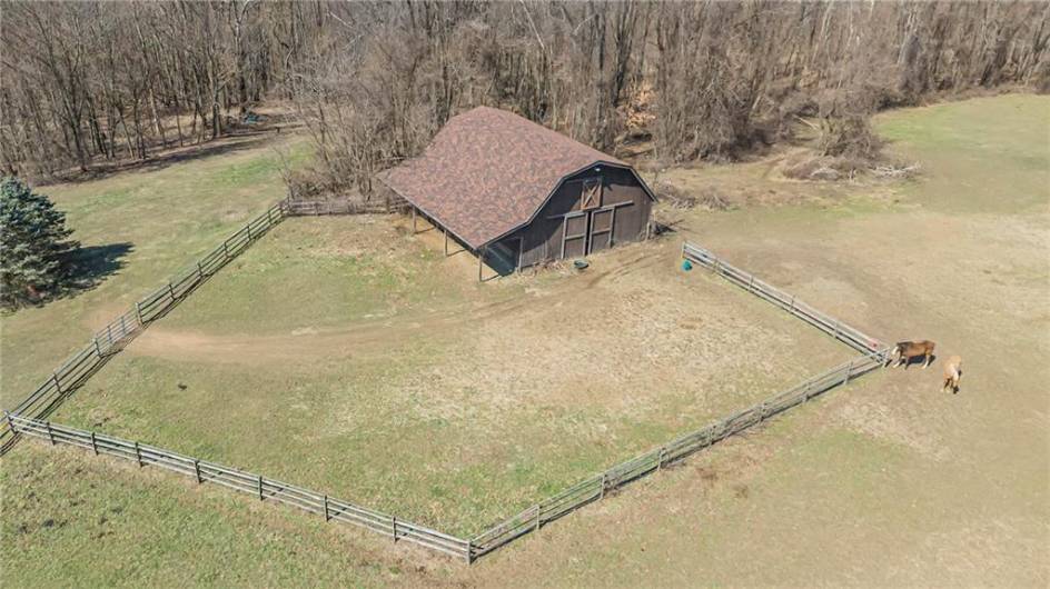 Aerial view of the horse barn and riding arena
