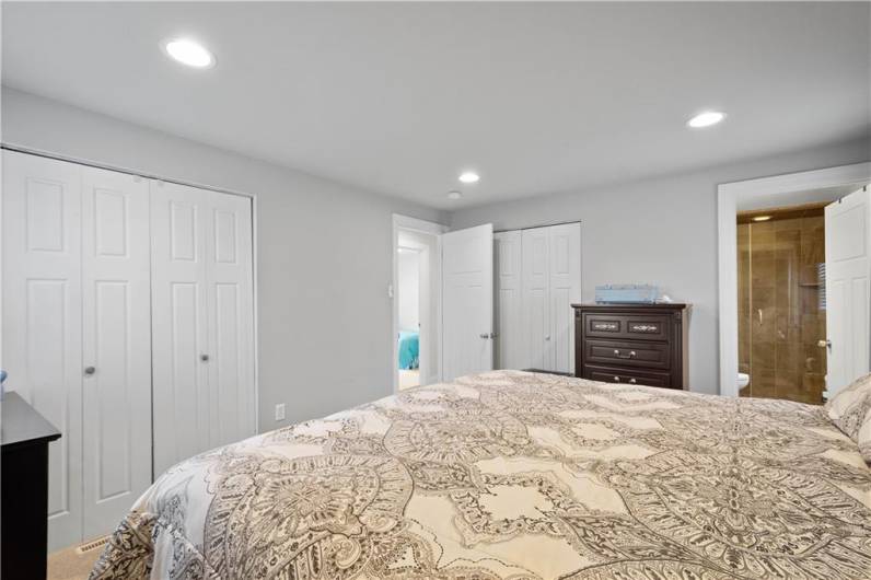 Neutral Carpet and Recessed Lighting