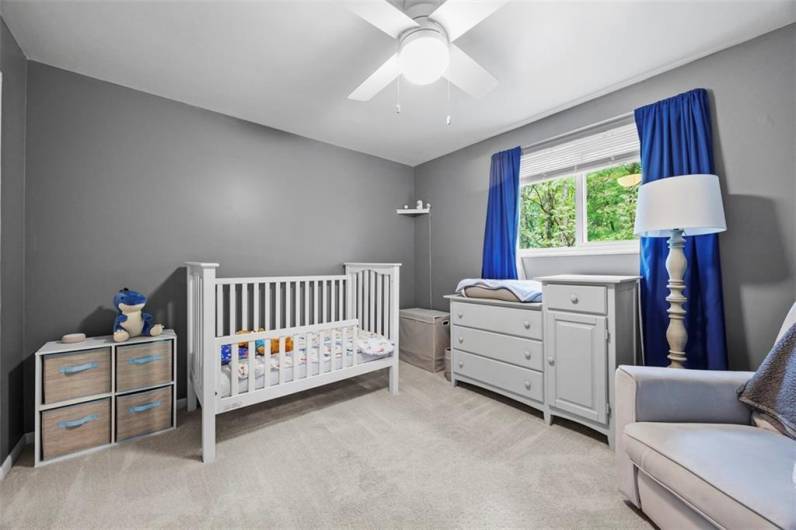 Bedroom Four.  Digitally altered to remove child's name on wall.