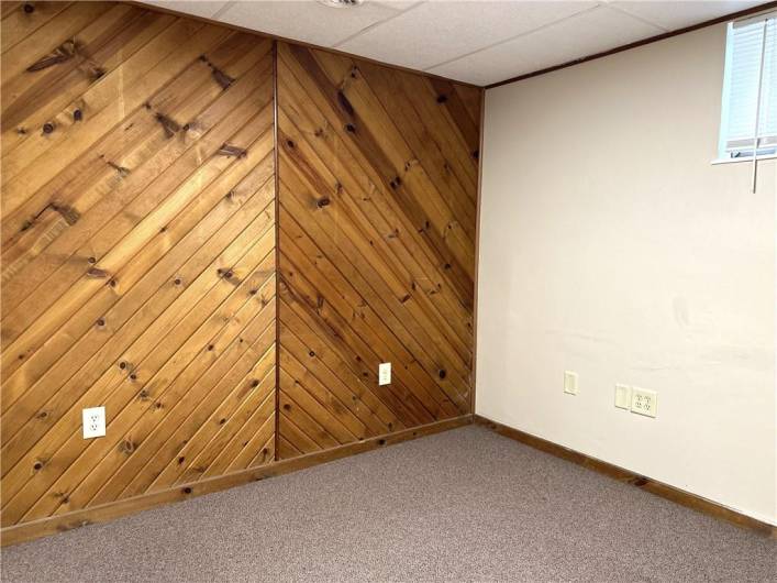 Another View of the Rear Office on Main Floor with Decorative Wood Wall.