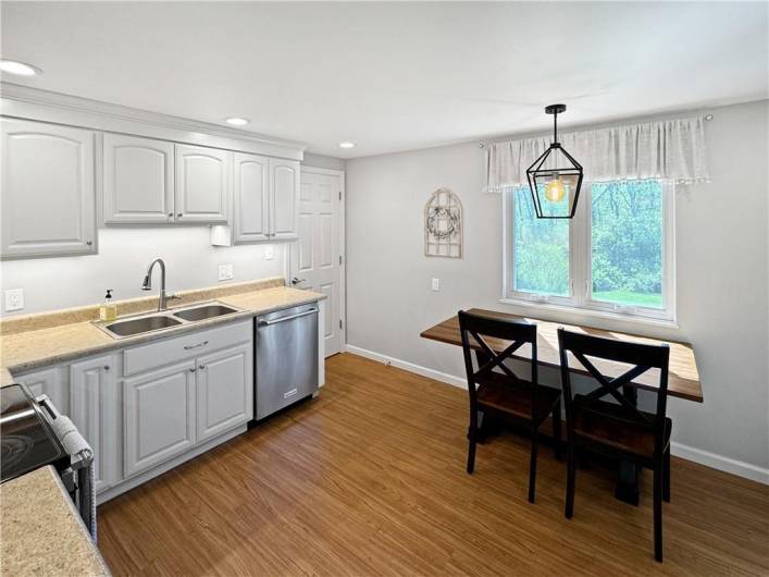 Stainless steel appliances are included.