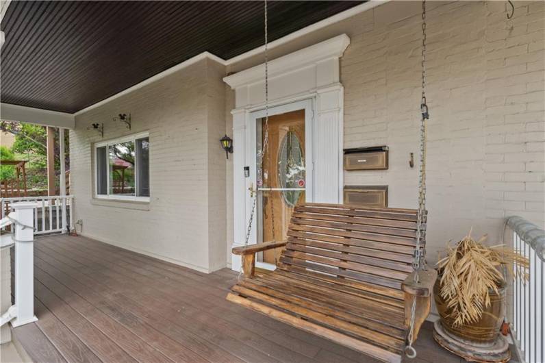 Swing on the covered front porch swing